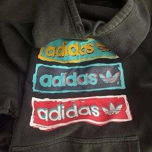 Adidas Kids Hoodie - Black with Red, Blue, and Yellow Accents